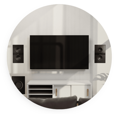 Wall-mounted TV with integrated speakers and media console in a modern living room, highlighting a clean, professionally installed home entertainment and audio system.