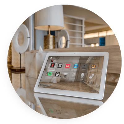 Tablet displaying a smart home control dashboard on a countertop, highlighting centralized control of lighting, audio, and connected home systems for convenient, modern living.